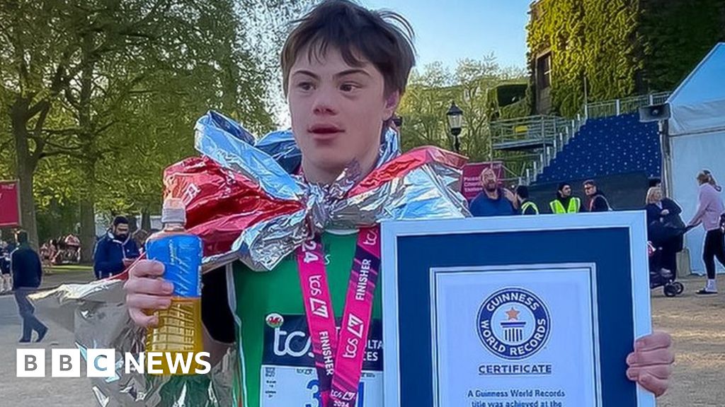 Down's syndrome teen gets marathon world record world updates